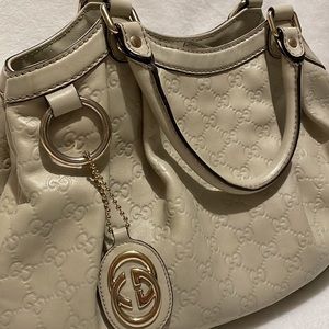 Gucci Guccissima Sukey leather bag and wallet